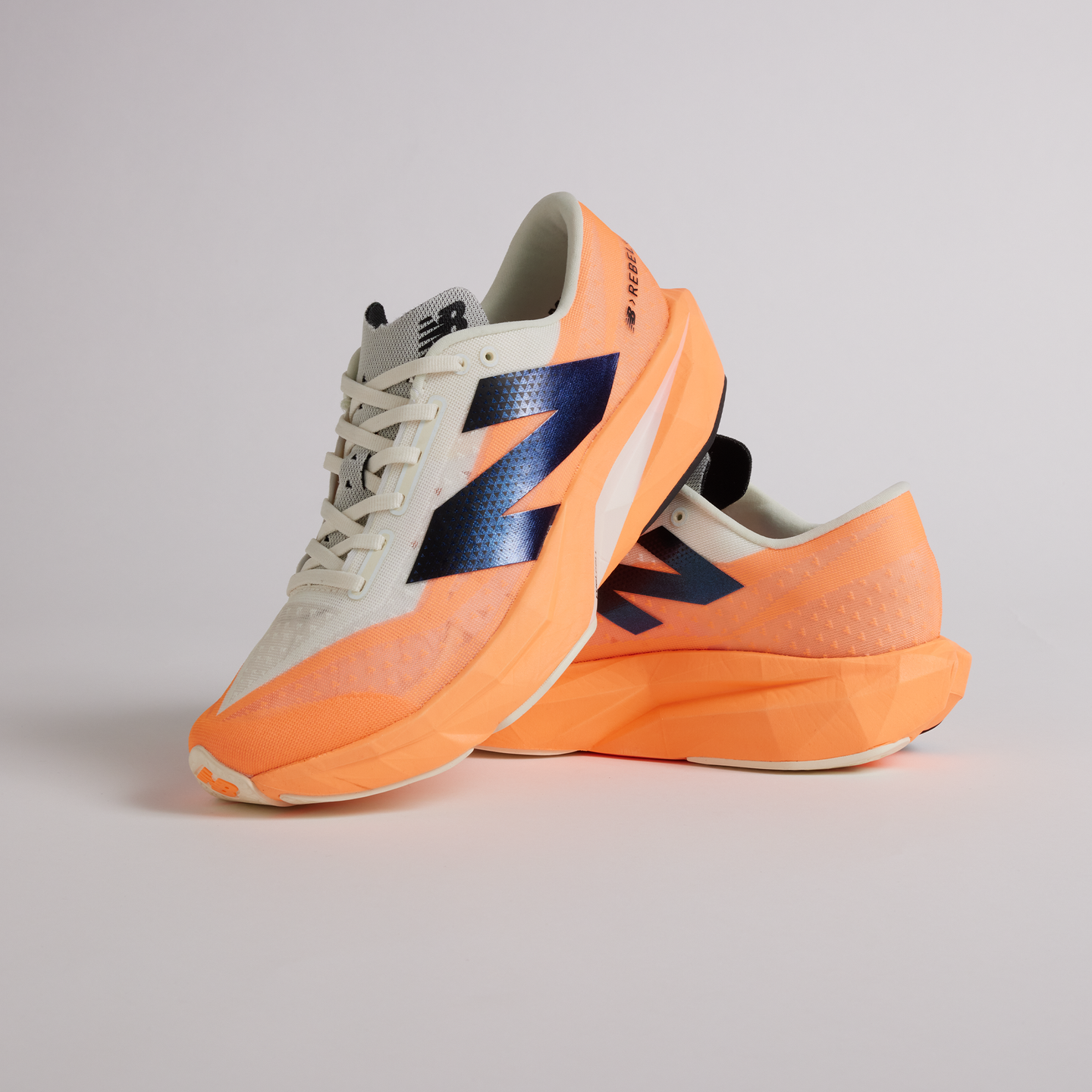Futócipő New Balance FuelCell Rebel v4 MFCXCO4 – narancssárga