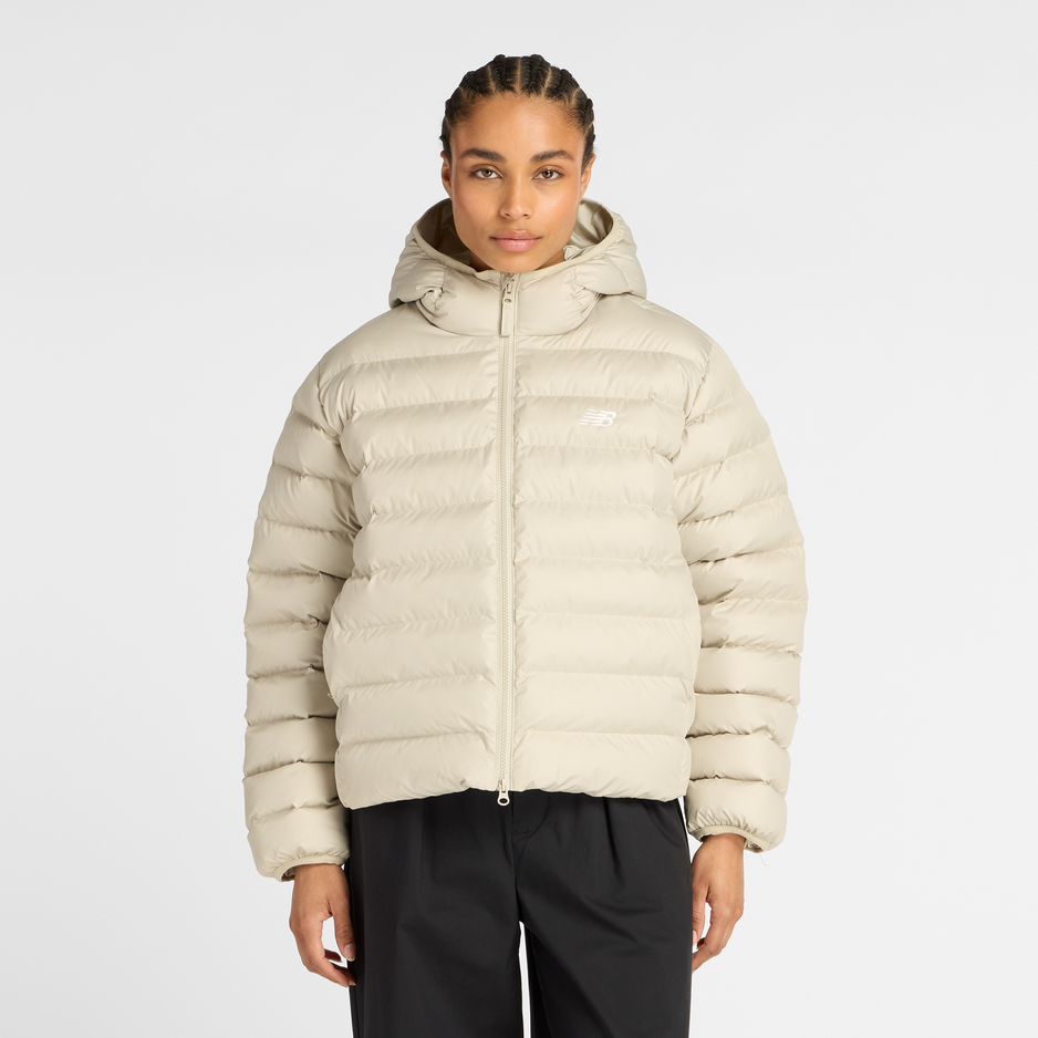 Női sportdzseki New Balance WO53500SHY – bézs