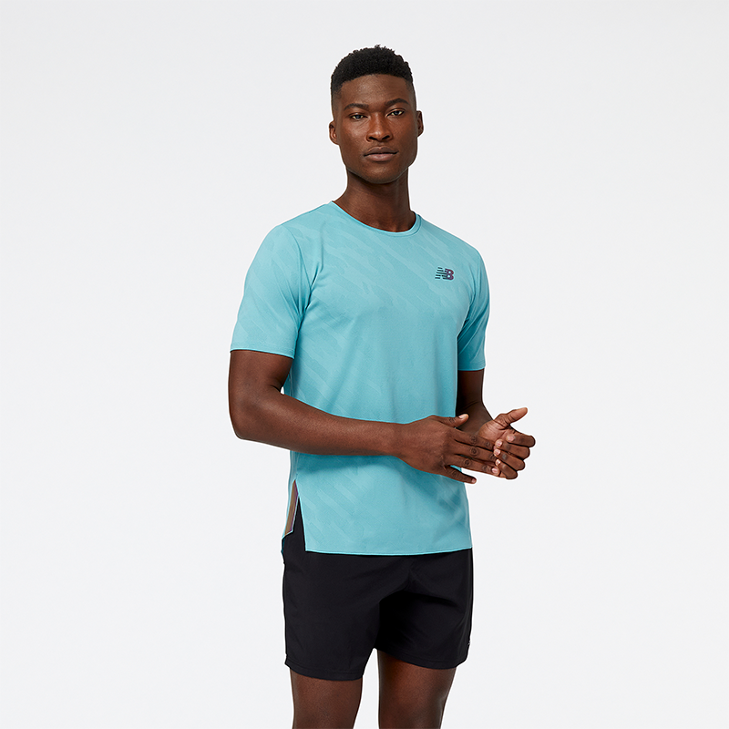 

Edzőpóló New Balance MT23281FAD – kék