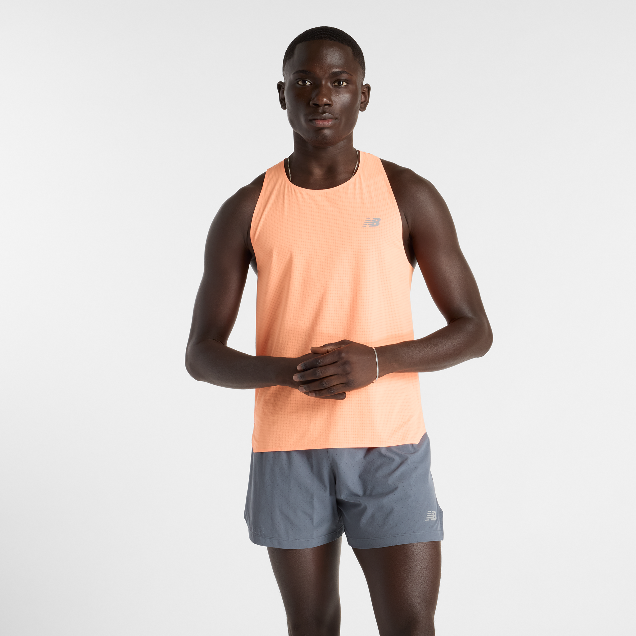 Férfi futópóló New Balance MT51205HMO – narancssárga