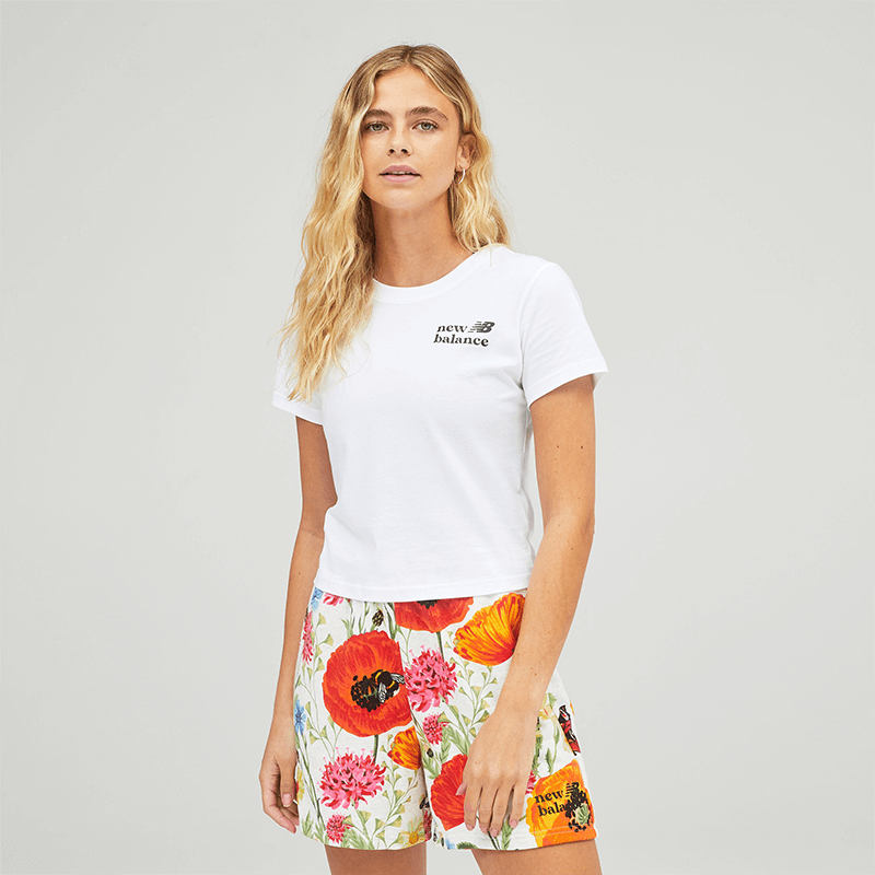 

Póló New Balance WT21561WT – fehér