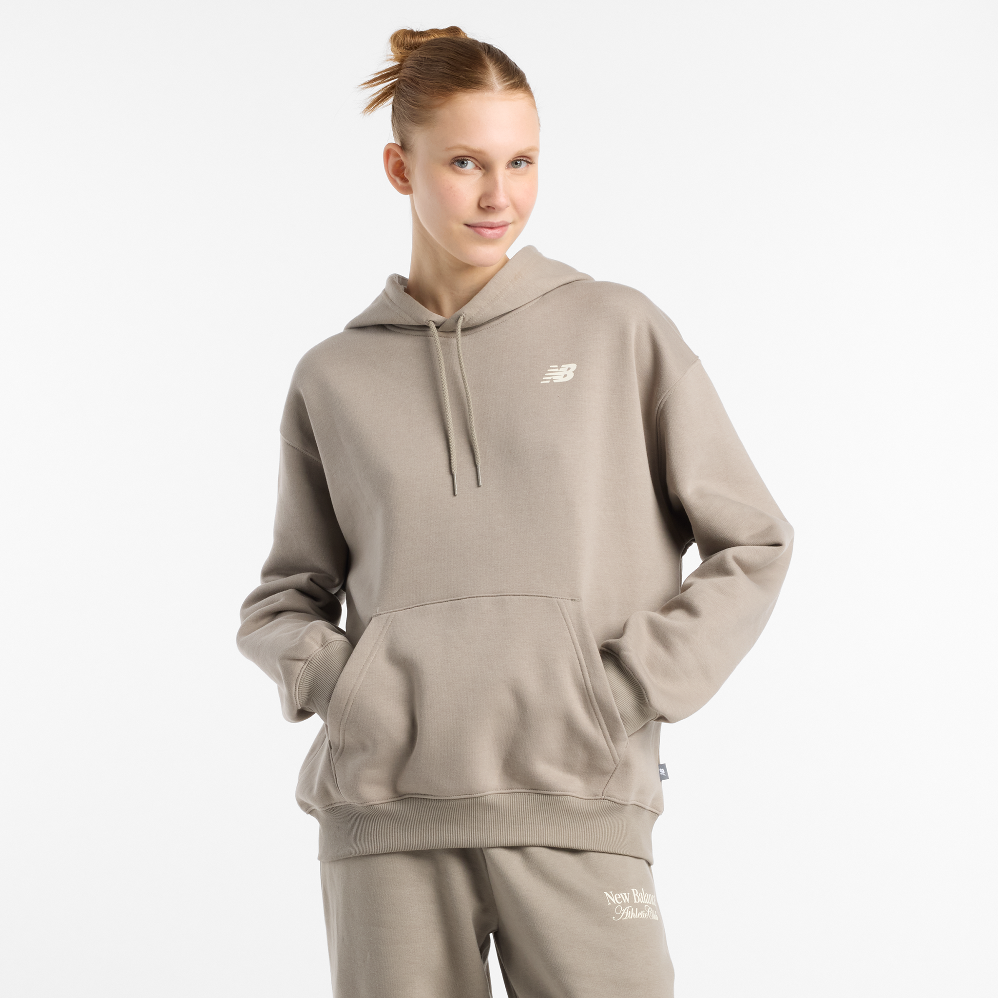 

Női felső New Balance WT51947DOK – bézs