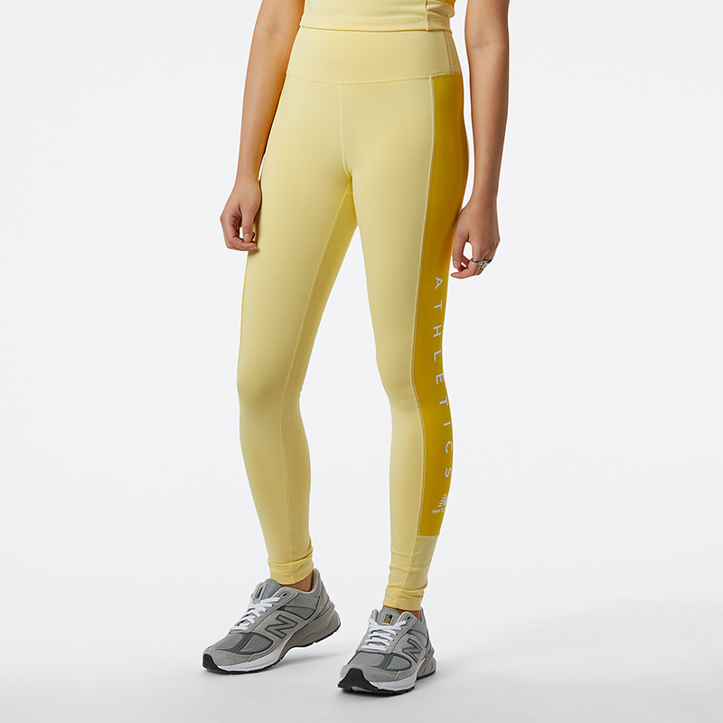

Nadrág New Balance WP23501HCM – sárga