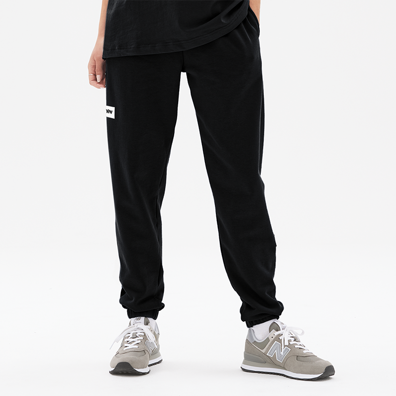 

Nadrág unisex New Balance UP23503BK – fekete